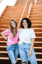 Load image into Gallery viewer, women&#39;s pink twist knot tee paired with ripped women&#39;s skinny fit high waist jeans. Women&#39;s white twist knot t-shirt paired with high waist ripped women&#39;s boyfriend denim 
