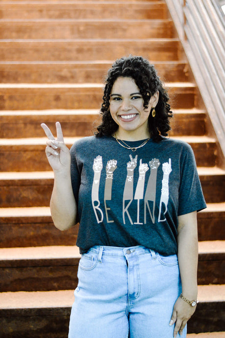 Women's ASL Be Kind Sign Language graphic tee. Paired with light wash ripped high waisted boyfriend jeans