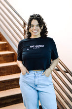 Load image into Gallery viewer, Women&#39;s Aint Laurent cropped graphic tee. Paired with ripped high waisted boyfriend jeans
