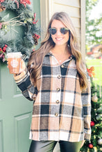 Load image into Gallery viewer, women&#39;s long sleeve button down black white and brown plaid shacket with faux leather pants and Starbucks coffee
