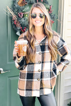 Load image into Gallery viewer, women&#39;s brown white black plaid oversized button down long sleeve shacked paired with a Starbucks cup and faux leather skinny pants
