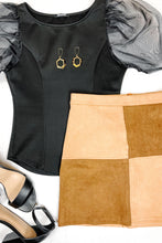 Load image into Gallery viewer, tortoise shell earrings with black puff sleeve usa made blouse and tan color block chocolate suede mini skirt and classy black strap heels. 
